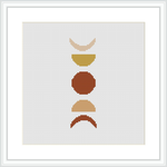 The image features an abstract cross stitch pattern consisting of four geometric shapes aligned vertically. These shapes resemble a modernist composition, featuring clean lines and a simplistic aesthetic. The piece is framed, showcasing the art against a background of white aida cloth.