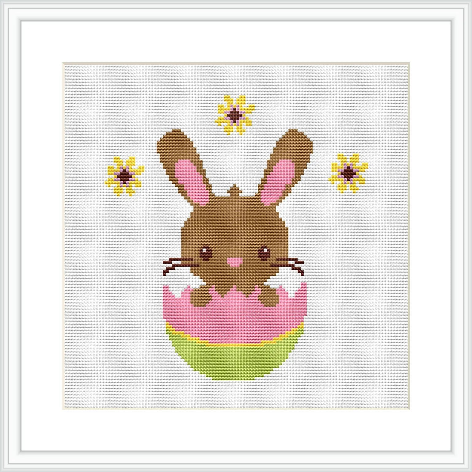 The image shows a pixel art-style cross stitch pattern of a brown Easter bunny with pink inner ears and cheeks, popping out of a decorated pink and green egg. The bunny is centered on a white canvas, with yellow and brown flowers dotted around it.