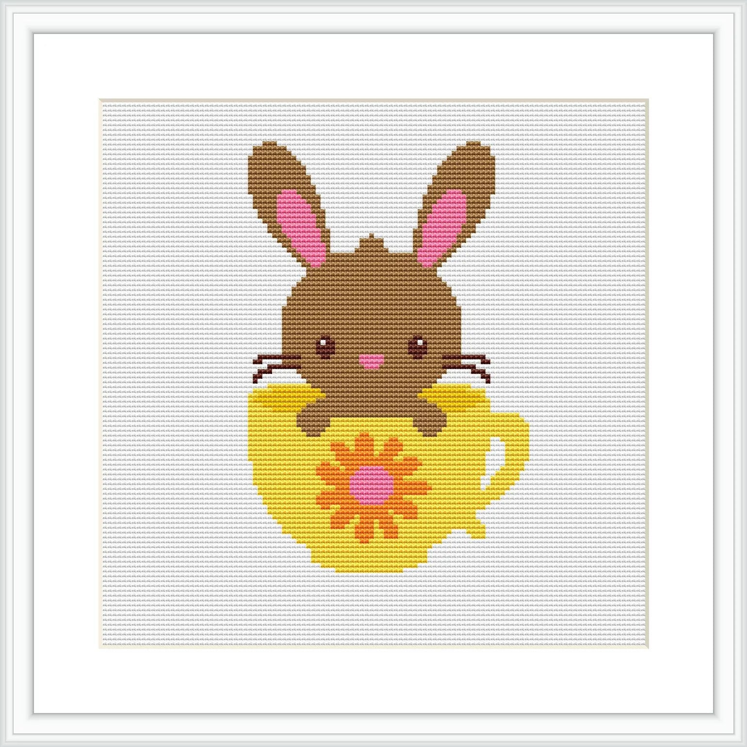 The image shows a cross-stitch pattern depicting a brown bunny with pink inner ears and blushing cheeks sitting inside a yellow egg-shaped cup with a red floral design on it. The background is white, and the pattern is framed with a simple square frame.