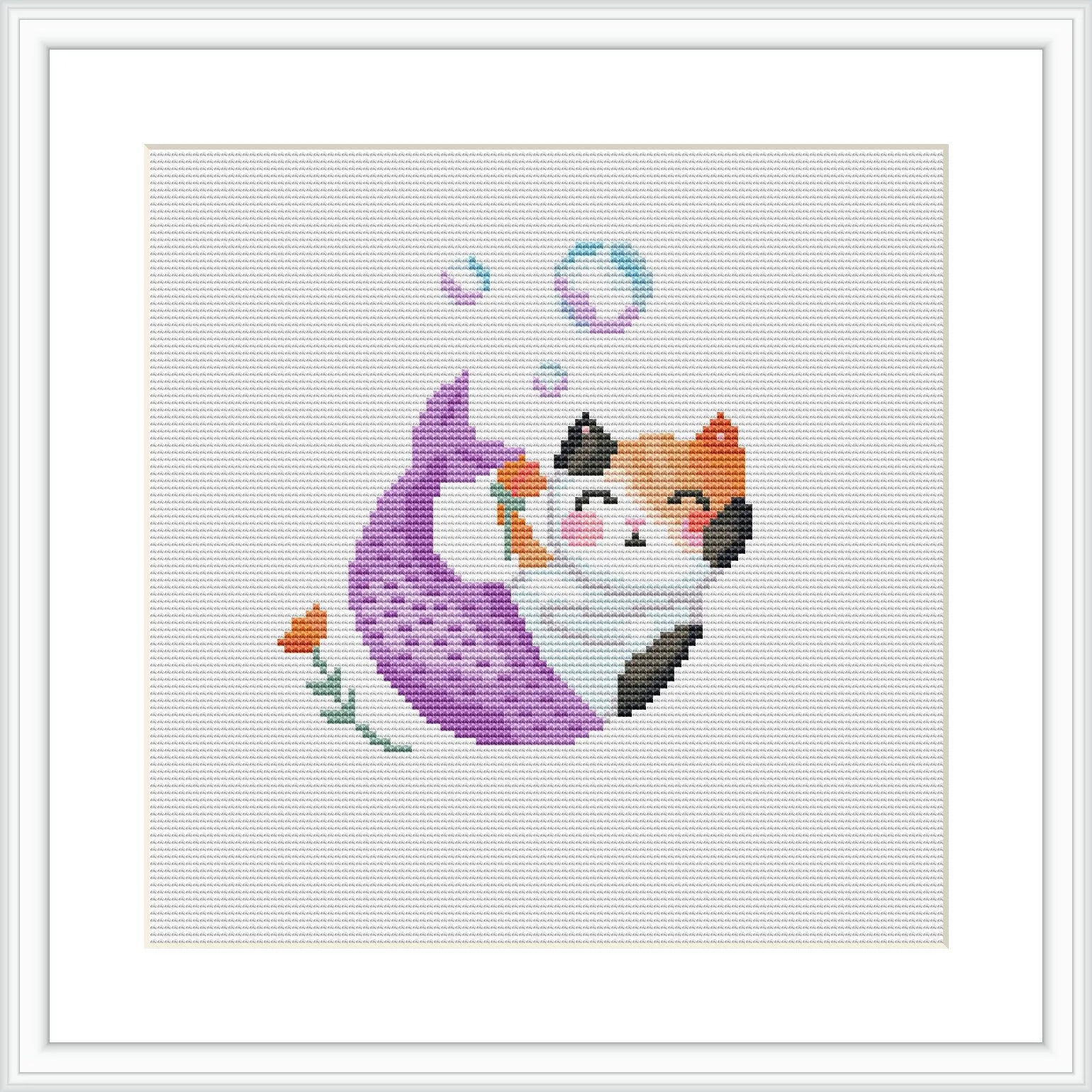 The image depicts a framed cross stitch design of a cat with a mermaid tail. The cat appears to be in the water with bubbles surrounding it, against a white background within a squared frame.