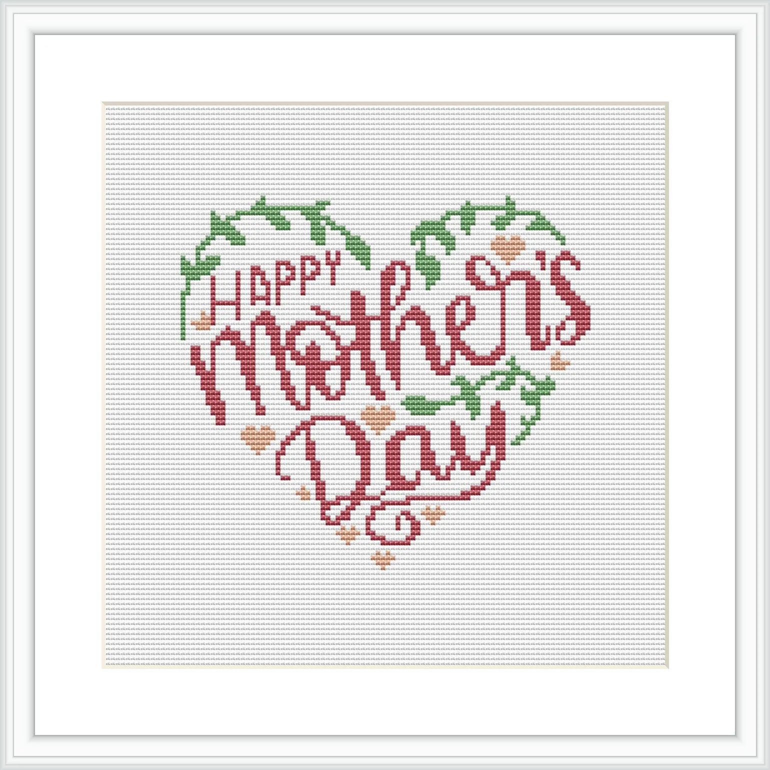 The image features a cross stitch pattern of a heart-shaped wreath composed of flowers and leaves, with the phrase 'Happy Mother's Day' in the center. The pattern is framed within a white square border and appears on a white background.