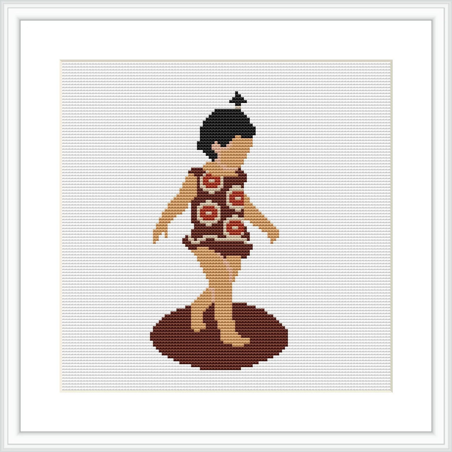 The image depicts a framed cross stitch pattern showing a toddler in mid-step on a brown circular base, dressed in an orange outfit with circle patterns and black hair tied up.