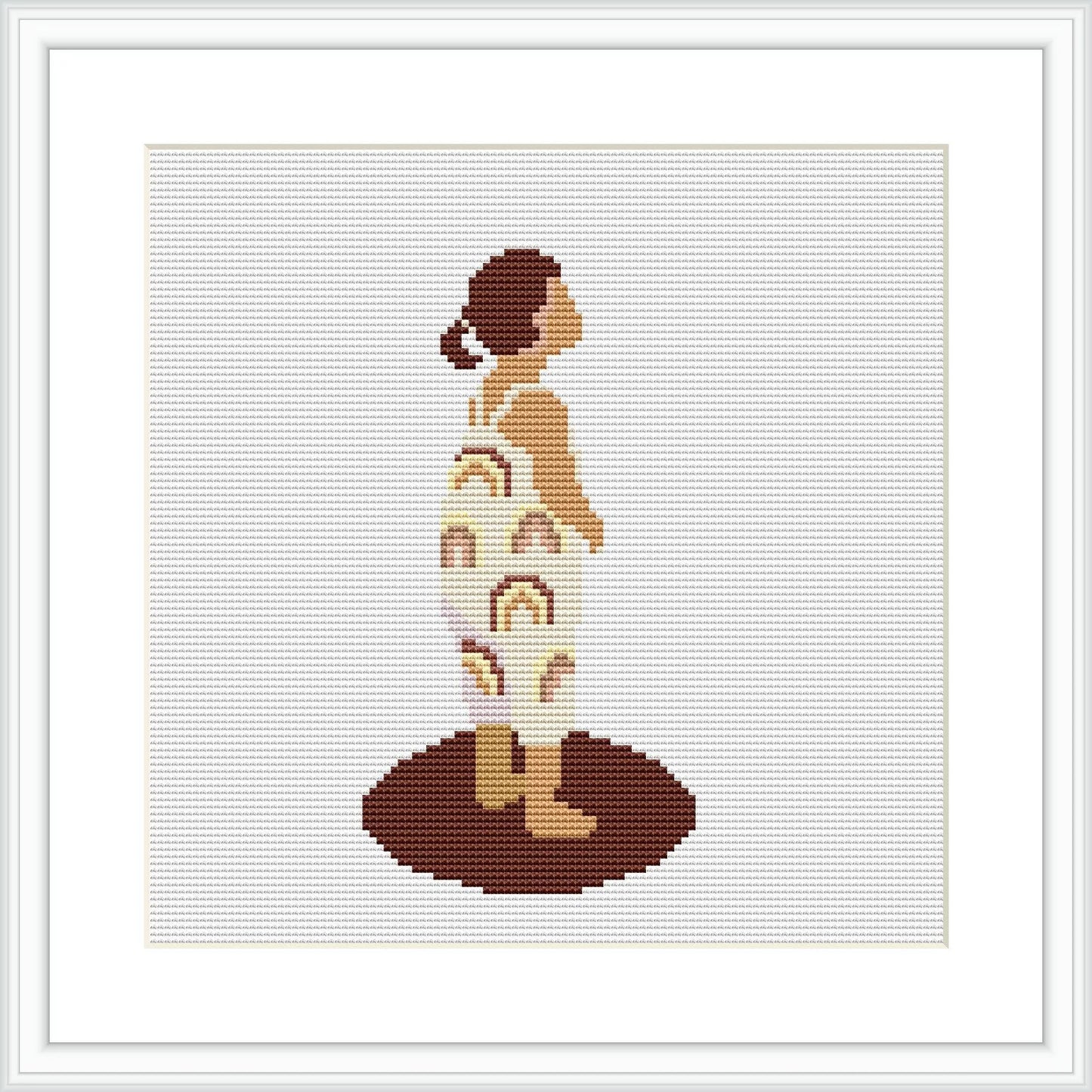 The image features a cross stitch pattern of a stylized toddler figure in silhouette, depicted with sections resembling orange slices. The toddler is standing, and the color palette includes shades of orange, cream, and brown. The background is plain white, and the piece is framed in a simple square frame.