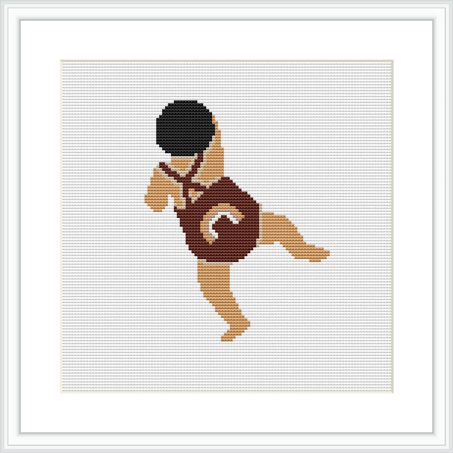 The image features a cross stitch design of a baby taking a step forward, in a brown and cream outfit, on a white background within a squared frame.