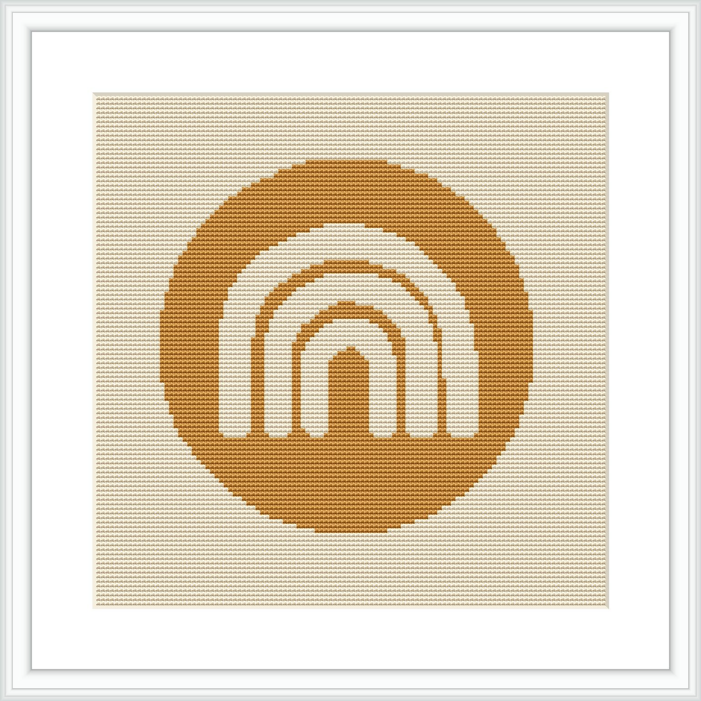 The image showcases a cross stitch pattern of geometric arches resembling a sunset, framed in white, against a solid beige background. Positioned centrally, the arches progress inward with shades of brown and yellow.