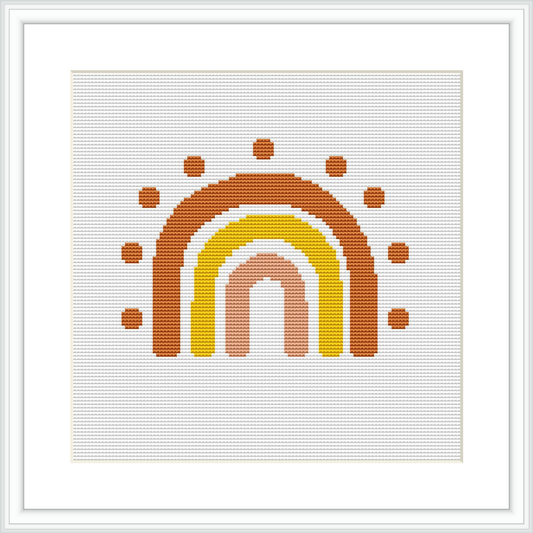 A cross stitch pattern of a simplified rainbow arch composed of dots, presented in a frame, on a white background.