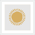 The picture shows a framed cross stitch pattern, placed against a white background. Centered on the canvas is a stylized sun with a solid round center in shades of yellow and gold, surrounded by rays represented by lines and geometric shapes.