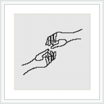 The image displays a cross stitch pattern featuring two human hands engaged in a delicate touch. The hands are intricately stitched using a series of black lines on a white canvas, framed with a simple black frame against a white background.