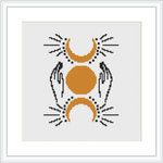 The image depicts a cross stitch pattern showing two symmetrical crescent moons on the top and bottom, cradling a central full moon. There are pairs of hands symmetrically positioned on the left and right sides of each crescent moon.