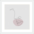 A framed cross stitch pattern featuring an abstract one-line feminine silhouette centered on a background gridded fabric. The silhouette is overlaid on a circular pink shade, giving the impression of a gentle aura or spotlight on the figure.