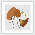 The image displays a cross stitch pattern framed in white. The pattern depicts an abstract female silhouette in profile, merged with a brown and beige crescent moon surrounded by small golden stars on a white background.
