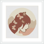 This image depicts a cross stitch pattern featuring the minimalist silhouette of a woman’s profile against a circular sepia-toned background. The piece is framed with a simple, white border.