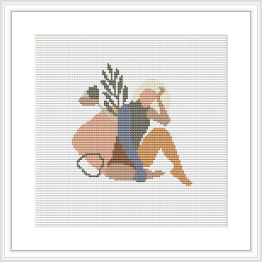 A cross stitch pattern depicting an abstract human figure in a seated pose with geometric shapes and organic ornamentation in a pastel and neutral color scheme.