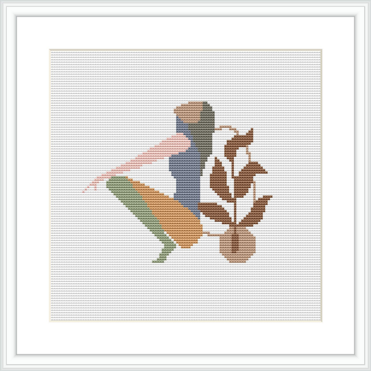 This image showcases a framed cross stitch pattern. It features an abstract silhouette of a woman with an earthy-toned leaf motif. The figure is centered within the square frame, set against a plain white background.