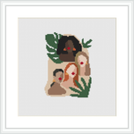 A framed cross stitch pattern depicting the outlines of three women's side profiles, adorned with leaves and flowers, against a white background.