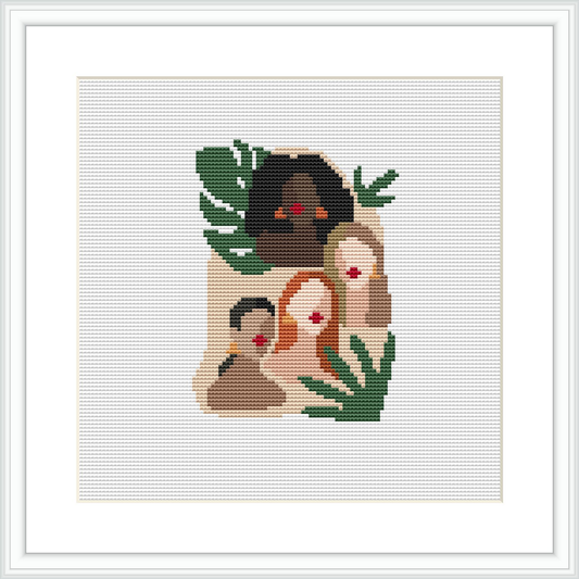 A framed cross stitch pattern depicting the outlines of three women's side profiles, adorned with leaves and flowers, against a white background.