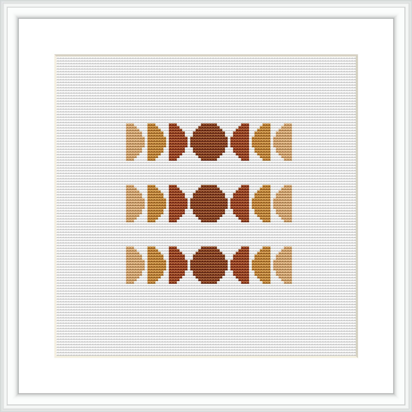 The image displays a framed cross stitch pattern featuring three rows of abstract geometric shapes, symmetrically arranged. The color palette used is subdued with shades of brown, tan, and cream. The design is centered within the frame on a white background.