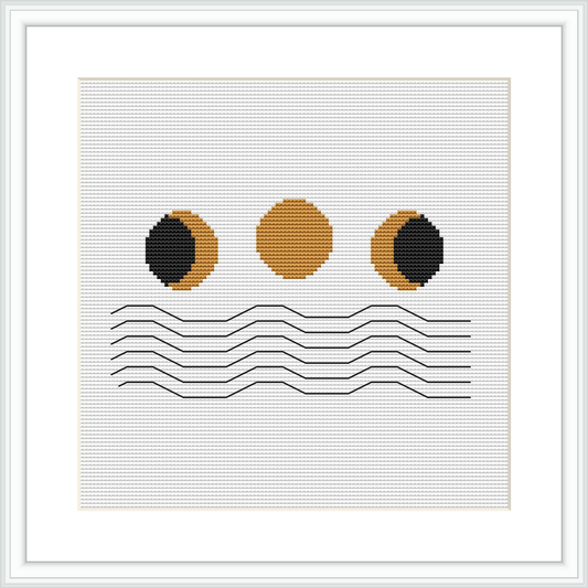 The image displays a cross stitch pattern framed in white, with an abstract design, depicting three round shapes in a horizontal line above a series of parallel lines all stitched onto a plain white canvas.