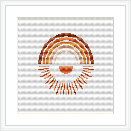 The cross stitch pattern depicts an abstract representation of a sunset with a semi-circular arc that resembles the sun. It is composed of multiple horizontal lines with varying lengths arranged in a gradient-like formation from the center to create the shape of the sun. The framing shows a simple white border.