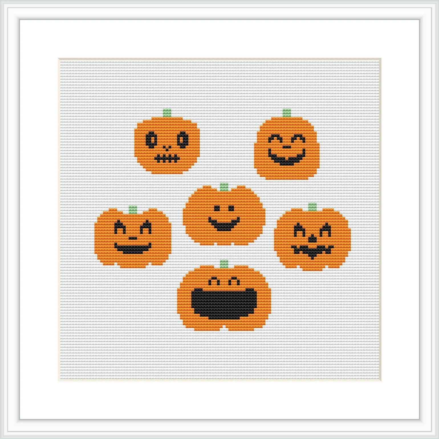 The image shows seven cross-stitched pumpkins with varying facial expressions aligned in a grid-like formation against a white fabric background. Each pumpkin is predominantly orange with black detailing for the eyes, nose and mouth, and a small patch of green at the top to represent the stem.