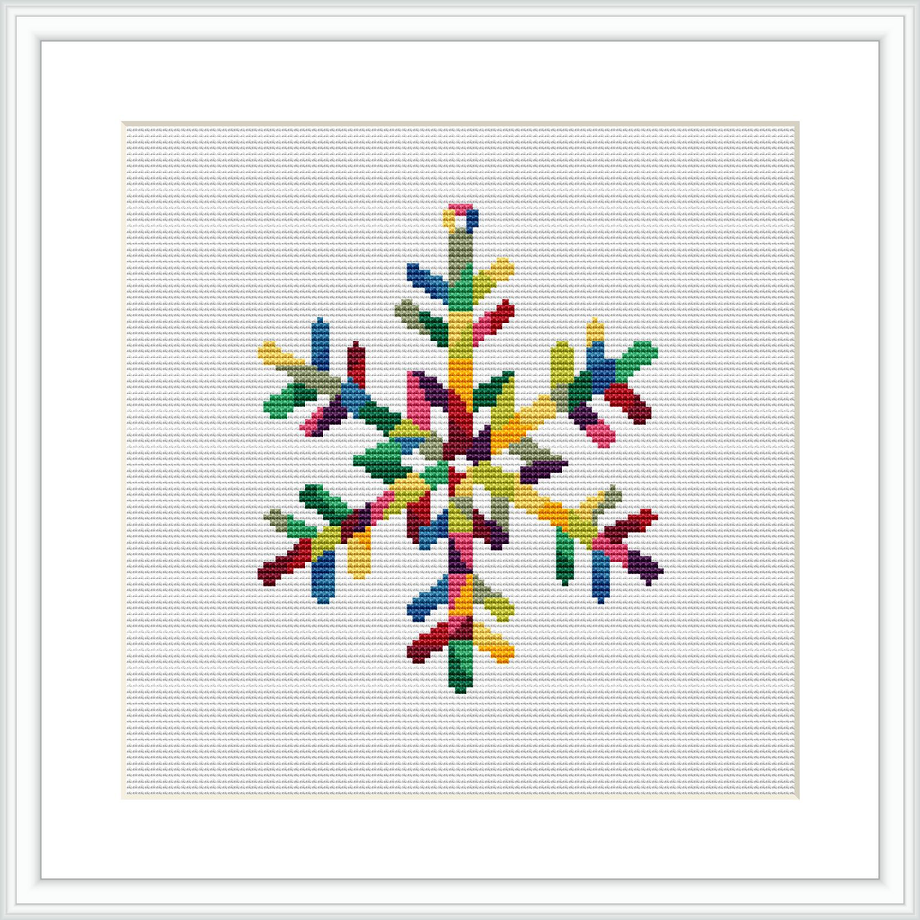 A framed cross stitch pattern depicting a colorful geometric snowflake on a white background, encased in a square frame.
