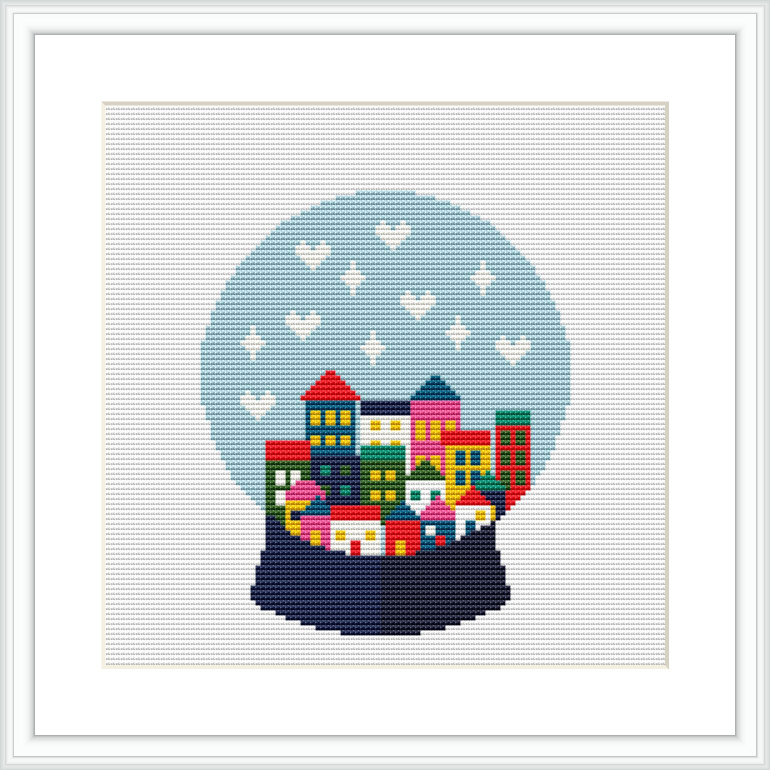 The image depicts a cross stitch pattern of a snow globe containing a colorful village with houses, trees, and snowflakes, all framed within a white border.