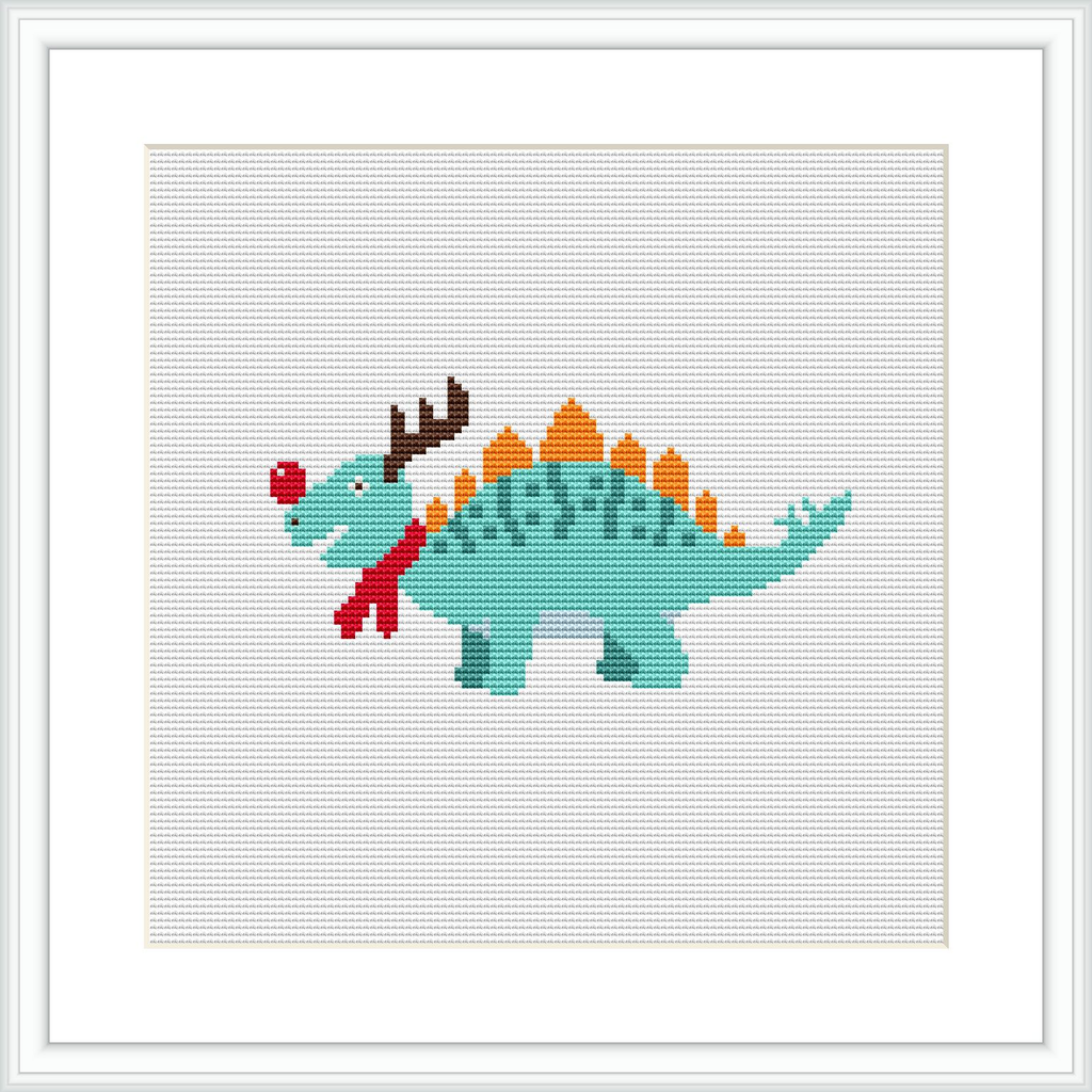 The image depicts a cross-stitch pattern of a green dinosaur with a red scarf and what appears to be reindeer antlers, embellished with decorative Christmas-themed patterns.