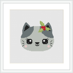 This cross stitch pattern depicts a grey cat with big, round eyes and prominent whiskers. The cat is accessorized with a small, red and green holly plant atop its head.