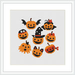 The image displays a cross stitch pattern composed of nine distinct pumpkin faces arranged in a three-by-three grid. Each pumpkin has various Halloween-themed decorations such as hats, bows, and bat wings against a stark white background.