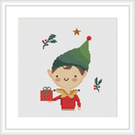 The image features an elf boy character in a festive attire, winking and holding a gift box with a bow. He's wearing a red outfit with a green hat, which has a red pom-pom on top. There are holly leaves with red berries and golden stars scattered around him.