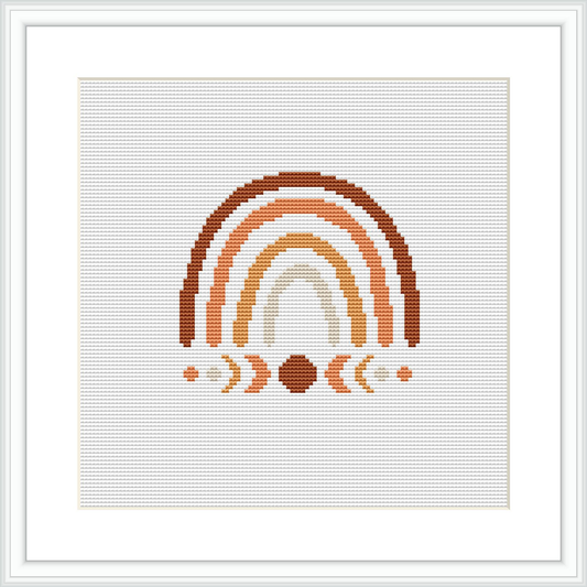 A cross stitch pattern showcasing a stylized plant that resembles a rainbow, with an earthy brown color gradient, made of several arches and dots, all framed within a square border on a neutral background.