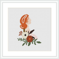 This cross stitch pattern depicts a stylized female silhouette overlaid with floral elements, primarily in peach, cream, and olive tones, framed by a simple white border against a plain white background.