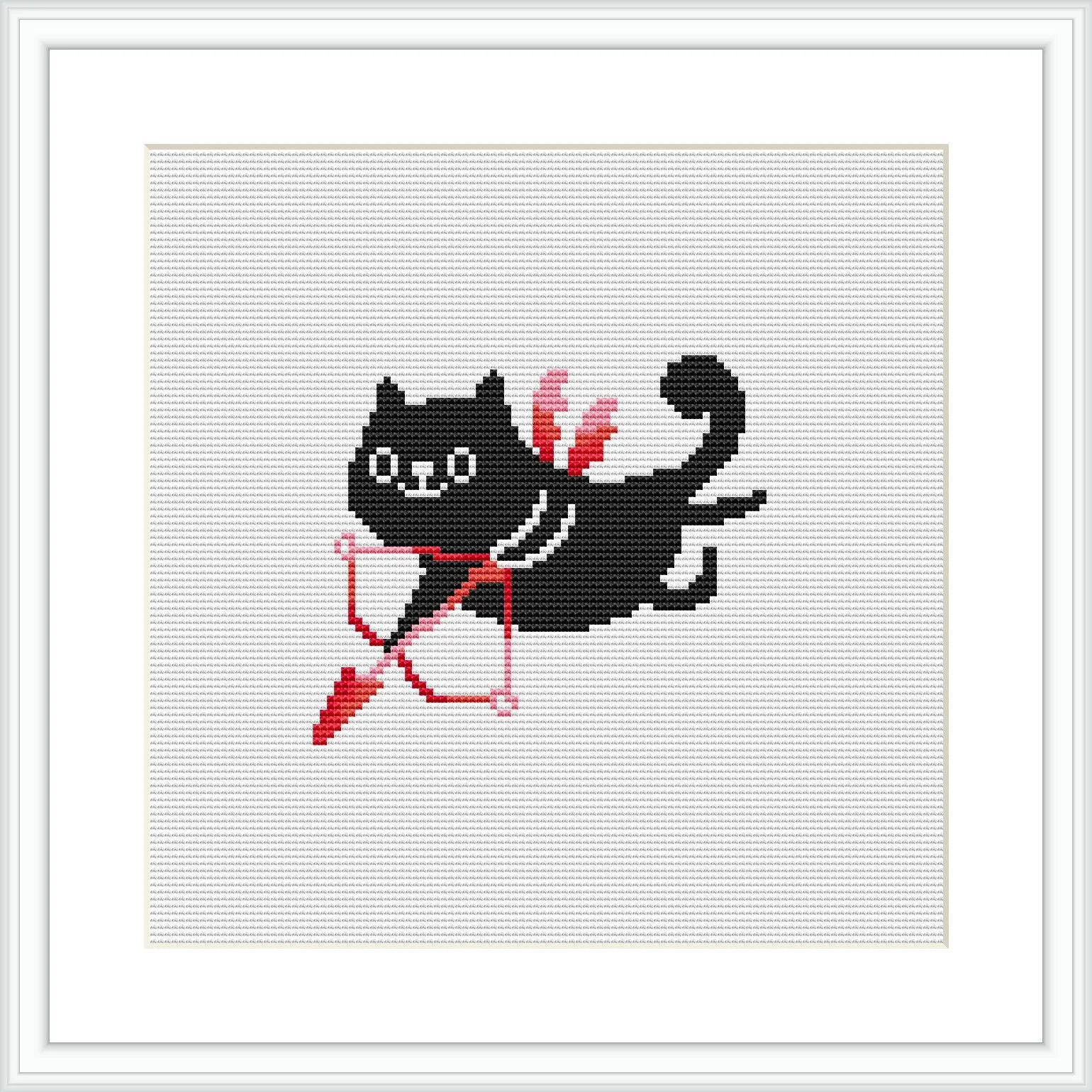 The image showcases a cross stitch design framed in white, featuring a black cat with stylized wings like those of cupid, and a red arrow. The pattern is depicted on a grid-like fabric typical for cross-stitching.