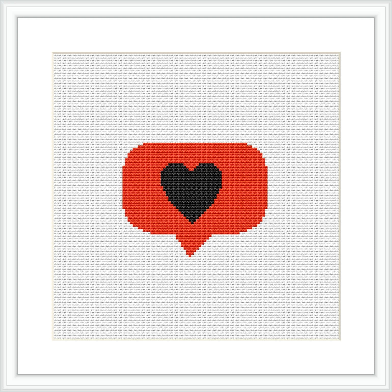 The image presents a cross stitch pattern framed in a white border. The pattern depicts a red speech bubble with a gray border containing a black heart in the center. The stitching is done on a white fabric which makes the colors stand out.