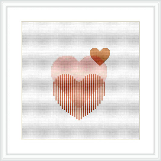 The image displays a cross stitch pattern with a large terracotta and pink striped heart that has a smaller brown heart on top, centered on a white background within a digital representation of a frame.