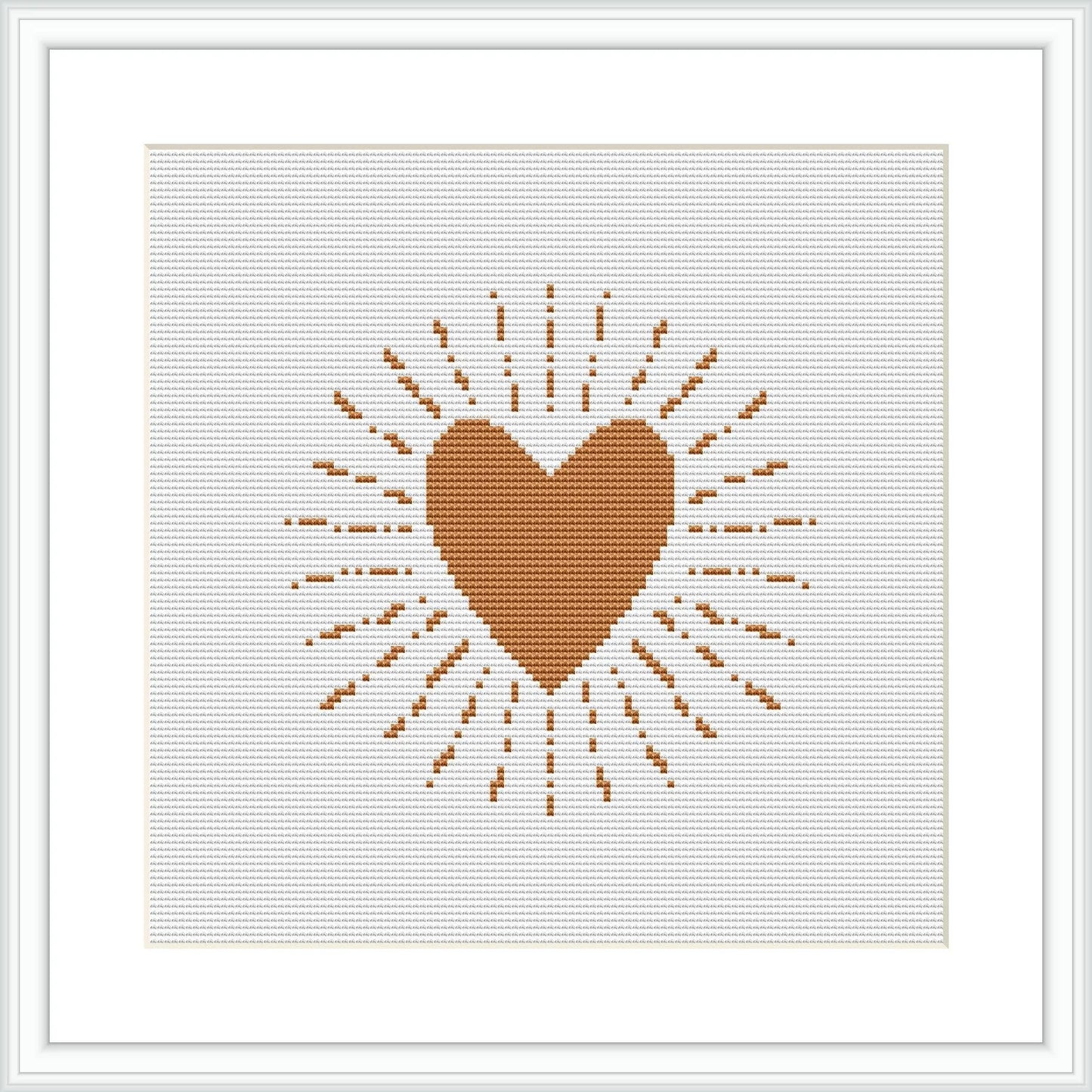 A cross stitch pattern displaying a centered brown heart with radiating lines and dots creating a sunburst effect, displayed on an ivory or white background within a frame.