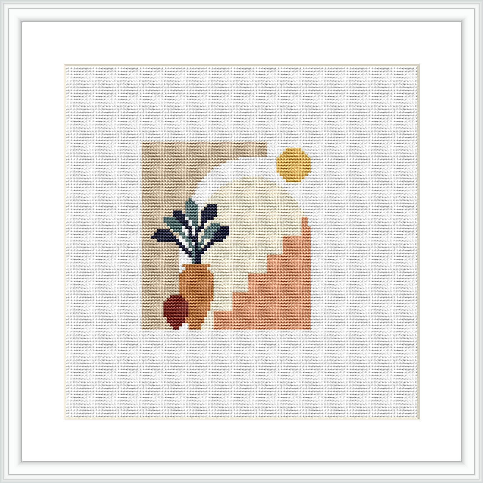 The image features a framed cross stitch pattern with an abstract design represented by geometric shapes including a partial circle, triangle, and organic shapes resembling vegetation, against a multicolored background.