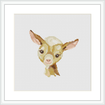 The image features a cross stitch pattern of a baby goat's head and upper shoulders. The goat has large, expressive eyes, and its head is slightly tilted. The background is plain, which highlights the subject matter.