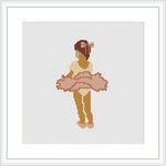 The image shows a cross stitch pattern of a ballet dancer standing on one leg with the other raised behind her. She is wearing a pink tutu and ballet slippers, and her arms are elegantly positioned. The background is white, emphasizing the figure.