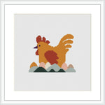 A cross stitch pattern depicting a stylized hen in shades of red and brown proudly standing on a mound of Easter eggs that feature a palette of green, gold, and cream. The design is centered within a square frame on a white background.