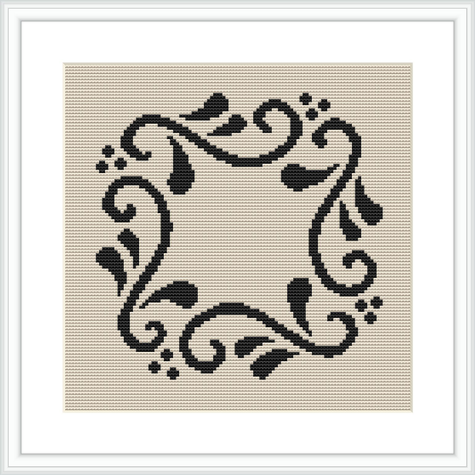 The image shows a square cross stitch pattern with a black floral frame design on a beige canvas, which is framed with a white border. The design is centered and symmetrical, featuring swirling floral elements and dots around an empty central space.