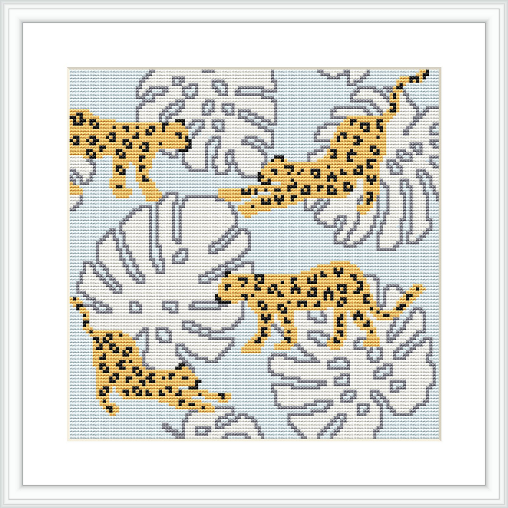 The image shows a cross stitch pattern featuring three leopards against a background of monstera plant outlines. The design is bordered by a simple white frame, and the leopards are colored in a gold and black pattern.