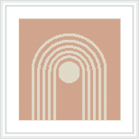 The image depicts a cross stitch pattern featuring concentric semicircles creating arch-like shapes on a beige canvas. The pattern is framed by a white border within a larger square frame.