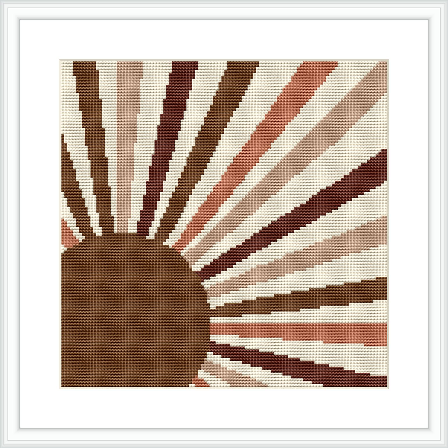 The image depicts a cross stitch pattern design of a stylized sun with rays emanating in geometric patterns, framed against a plain white background.