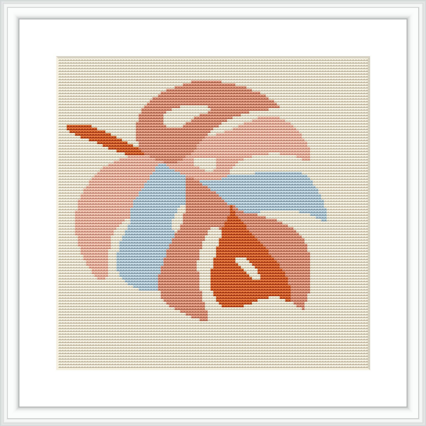 The image shows a framed cross stitch pattern featuring the stylized image of a monstera leaf. The leaf is rendered in shades of pink and blue on an ivory fabric background. The overall design is simple yet captures the essence of the tropical plant.