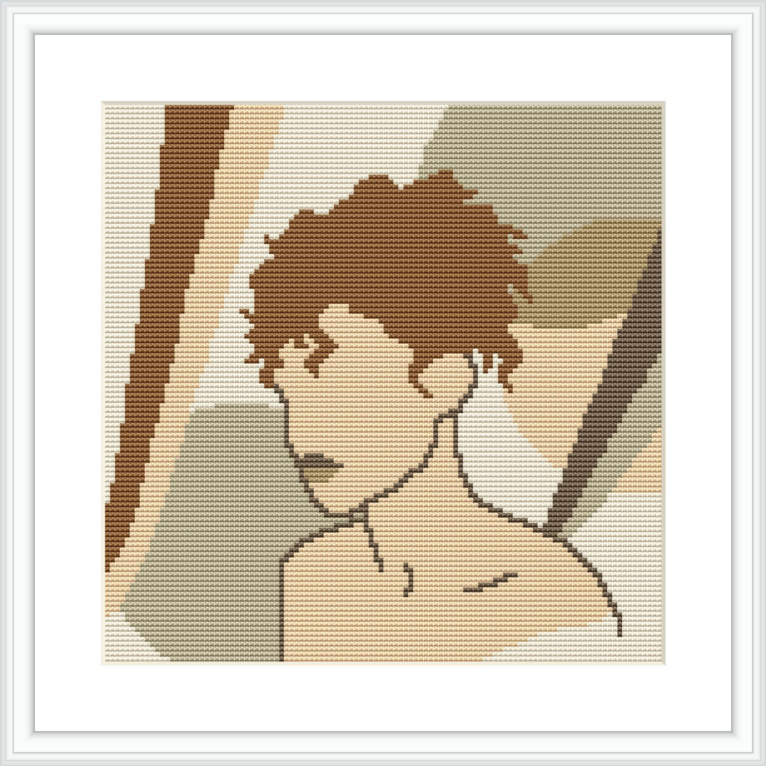 The image features a cross stitch pattern of a woman in profile with short hair against a geometric backdrop. It is framed, suggesting a completed project ready for display.