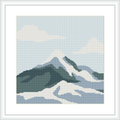 The image depicts a cross stitch pattern of a snow-capped mountain range with varying shades of white, blue, and green, against a pale sky with a white border framed within a square.