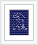 The image displays a framed cross stitch pattern of Matisse's Blue Nude II, against a white background. The embroidery features the outline of a seated nude figure, in white against a solid blue background, encased within a simple white frame.