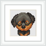 The image shows a square cross stitch pattern framed in white, depicting a stylized Rottweiler puppy with a playful expression.