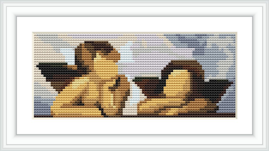 The image is a cross stitch pattern showcasing two angels engaged in playing music; one appears to be singing while the other is playing an instrument, set against a background that transitions from cream to blue.